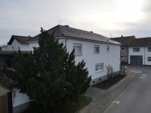 Seitenansicht Einfamilienhaus mit Gewerbeeinheit